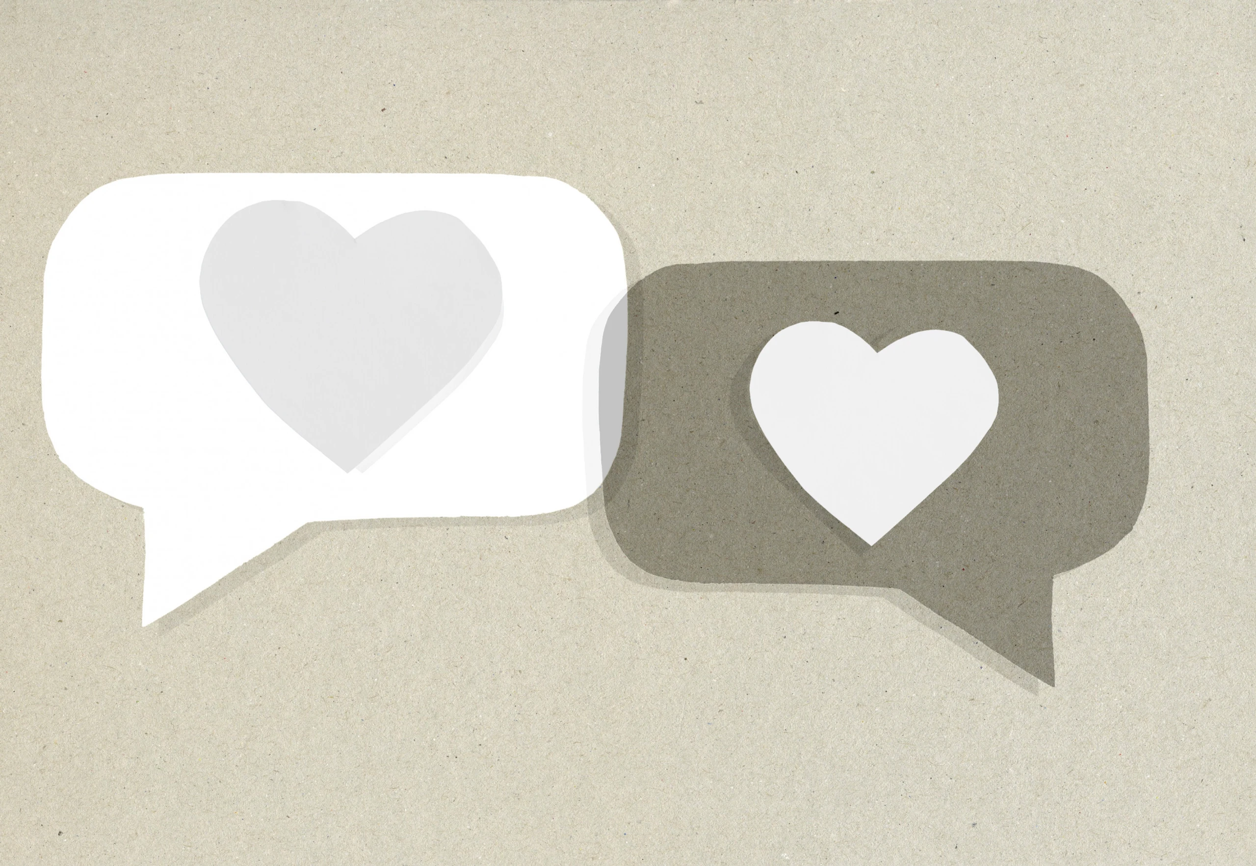 Zwei Sprechblasen mit Herzen